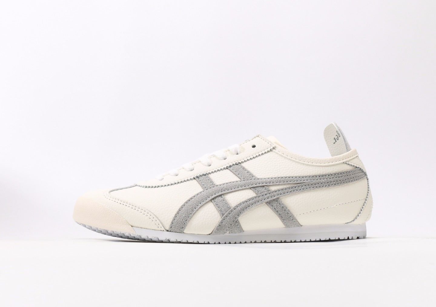 Onitsuka Tiger/ Asics